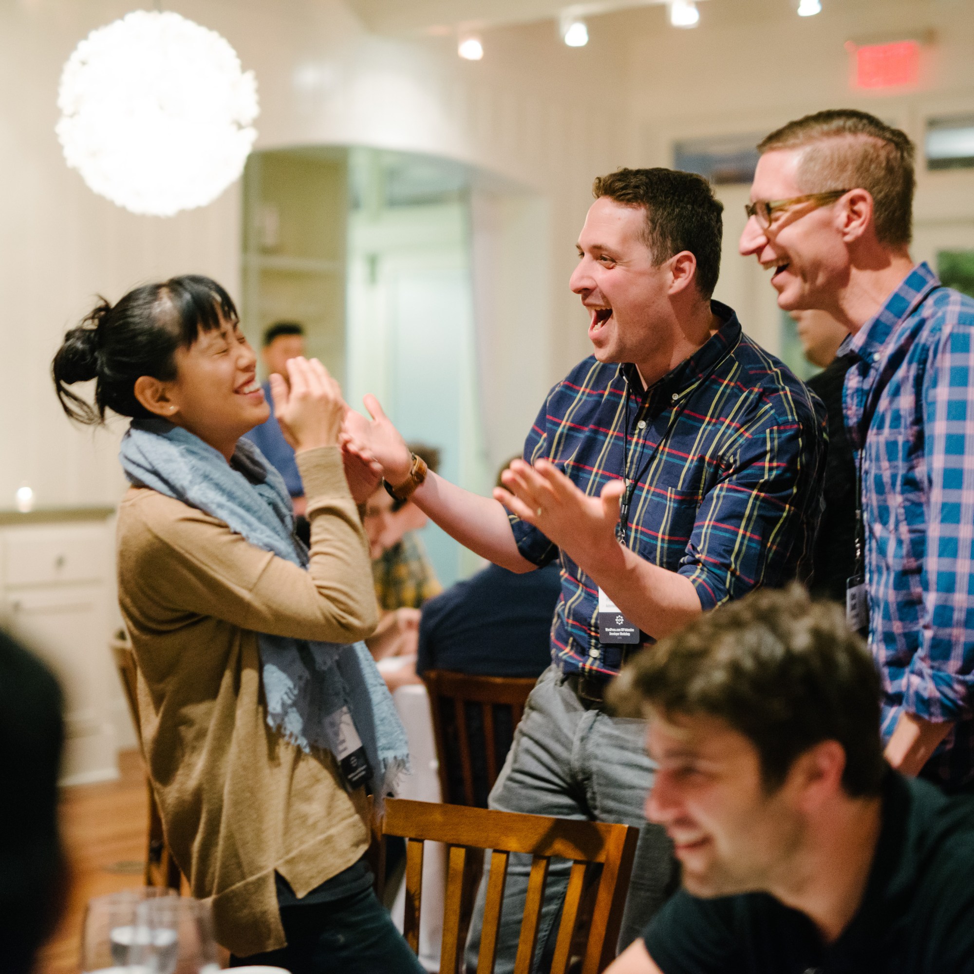 People laughing at a workshop in Napa